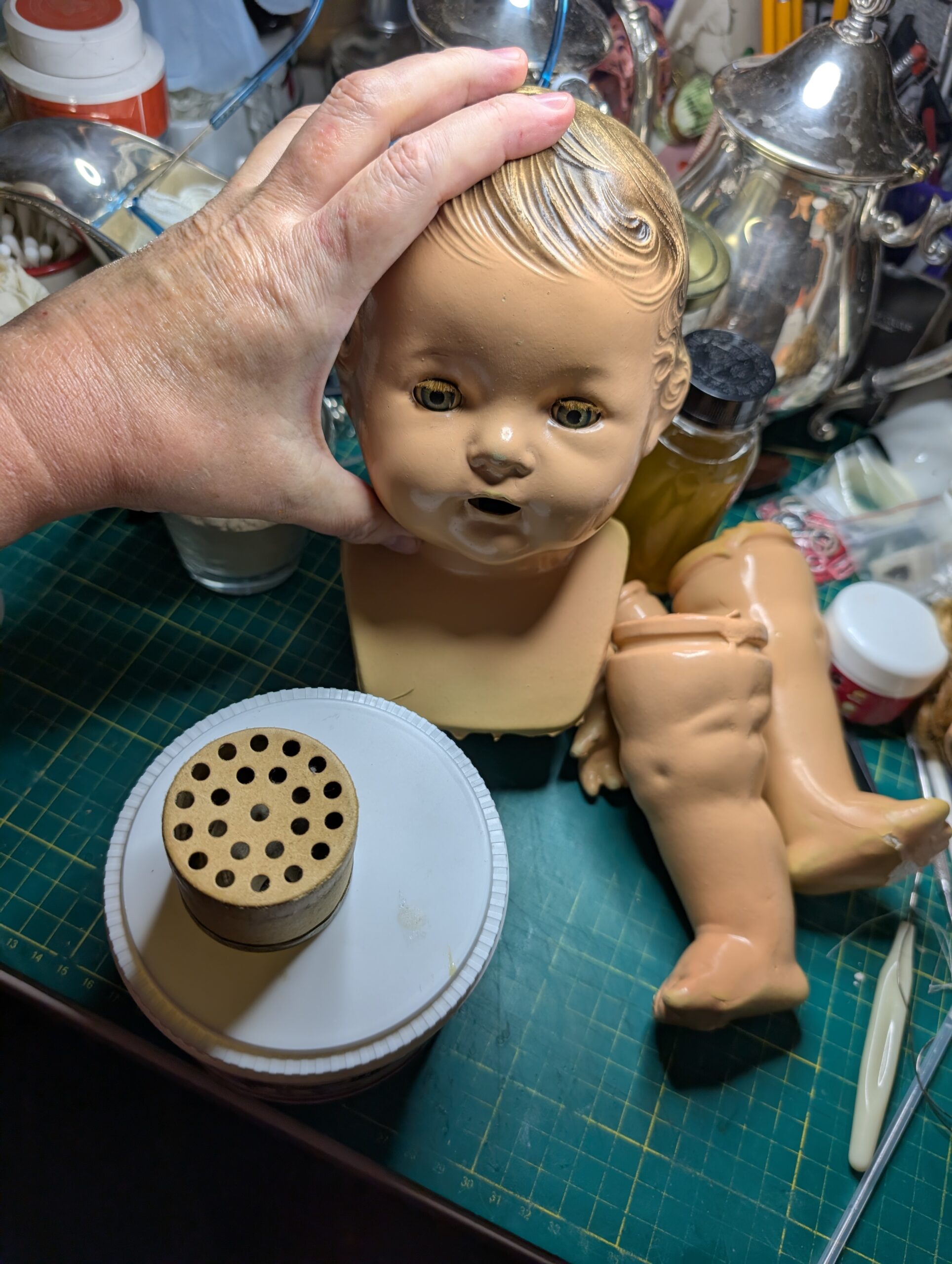 Step-by-step instructions for repairing composite doll coating problems using bone glue and shellac