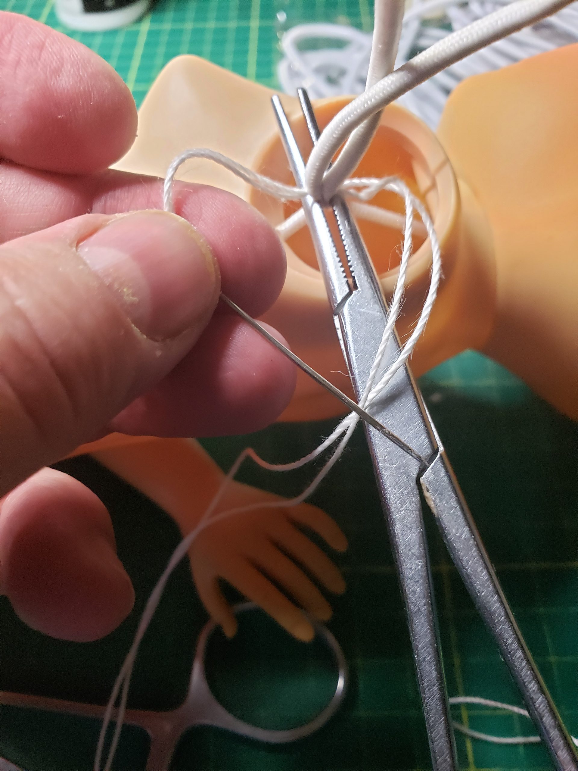 STEP-BY-STEP INSTRUCTIONS FOR RESTRING DOLL BODY